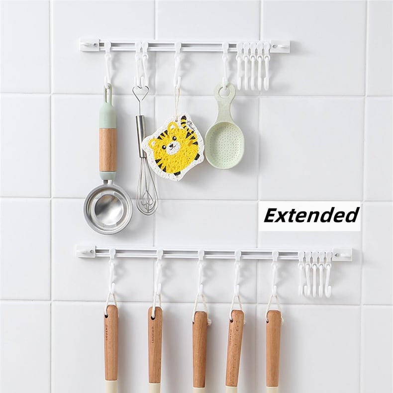 🥳2026 HOT SALE🥳💞50K+ SOLD!🧺🔧 50% OFF! Multifunctional Slide Rail Hook – Punch‑free installation, adjustable hook spacing. Holds utensils, towels & robes – no wall damage! 🏠✨